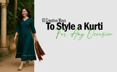 A smiling woman walking outdoors in a dark teal-green Anarkali kurti with gold borders, carrying a woven bag and a red patterned dupatta; text overlay reads "10 Creative Ways To Style a Kurti For Any Occasion."