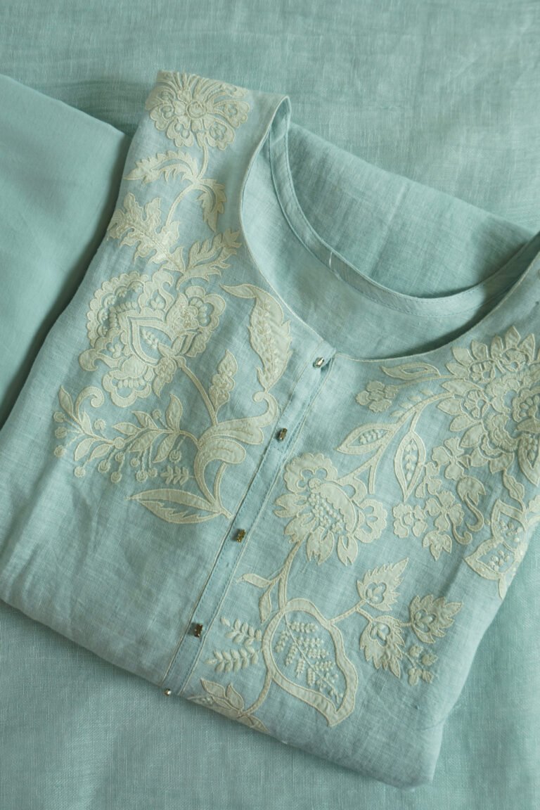 Semi-stitched kurti with delicate embroidery featuring floral motifs, suitable for festivals, traditional celebrations, and casual ethnic wear for women.