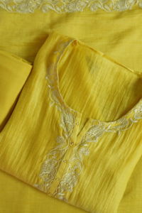 Yellow Marigold semi-stitched kurti with intricate embroidery on neckline, stylish and comfortable for festivals, casual outings, and special occasions.