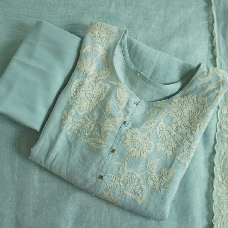 Semi-stitched kurti with delicate embroidery featuring floral motifs, suitable for festivals, traditional celebrations, and casual ethnic wear for women.