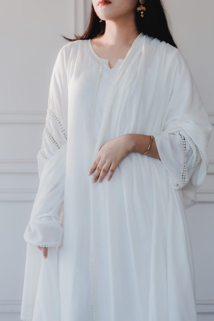 Side profile showing lace sleeve