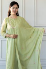 Woman wearing Aravi light green kurti with dupatta – front pose