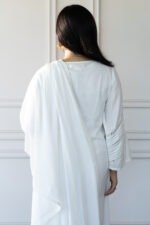 Back view of Sufaira showcasing fabric flow and dupatta