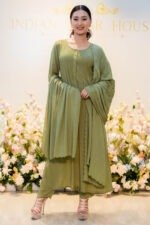 Flat lay of Verdant Veil kurti and dupatta with floral backdrop