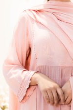 Close-up of lace detailing on sleeve and neckline of Aangan Aura kurti