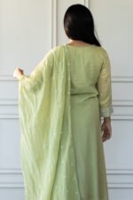 Back view of embroidered kurti with dupatta featuring floral detailing.