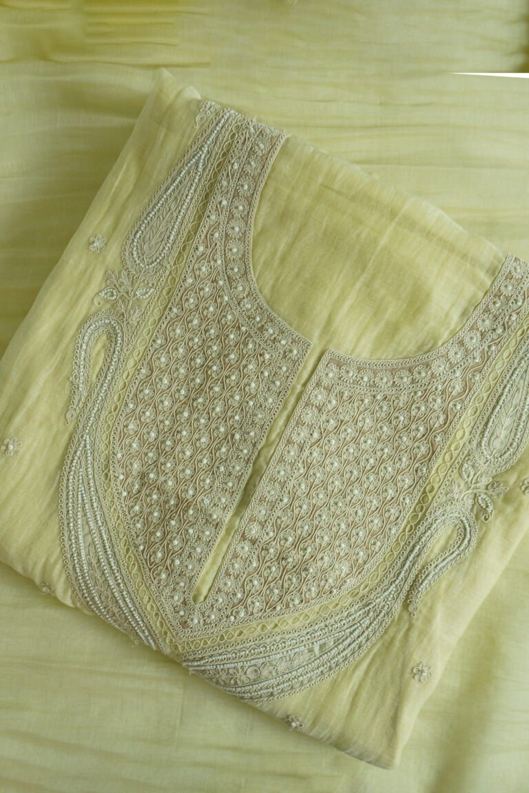 Semi-stitched kurti in a soothing light color with detailed embroidery on the neckline, suitable for festivals, traditional events, and stylish ethnic wear for women.