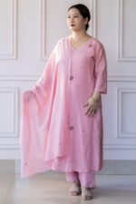 Full outfit view with matching pants and dupatta in soft pink tones