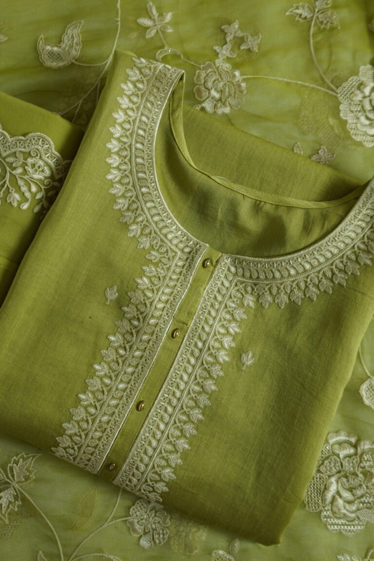 Semi-stitched Sunlit Bloom Chikankari kurti with delicate floral embroidery, suitable for festivals, weddings, and traditional events, crafted from high-quality fabric in a bright, vibrant color.