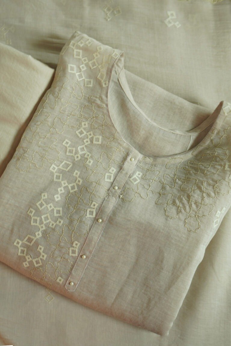 Semi-stitched Whispering Moon kurti with subtle embroidery on a soft, muted fabric, ideal for festivals, casual, and traditional wear, customizable for a perfect fit.