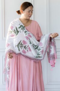 Portrait of model wearing Yashna with minimal jewelry and soft makeup