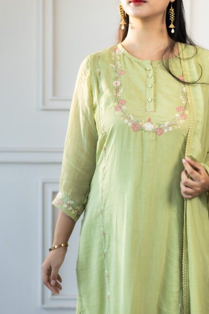 Close-up of Aravi kurti neckline embroidery with dupatta drape