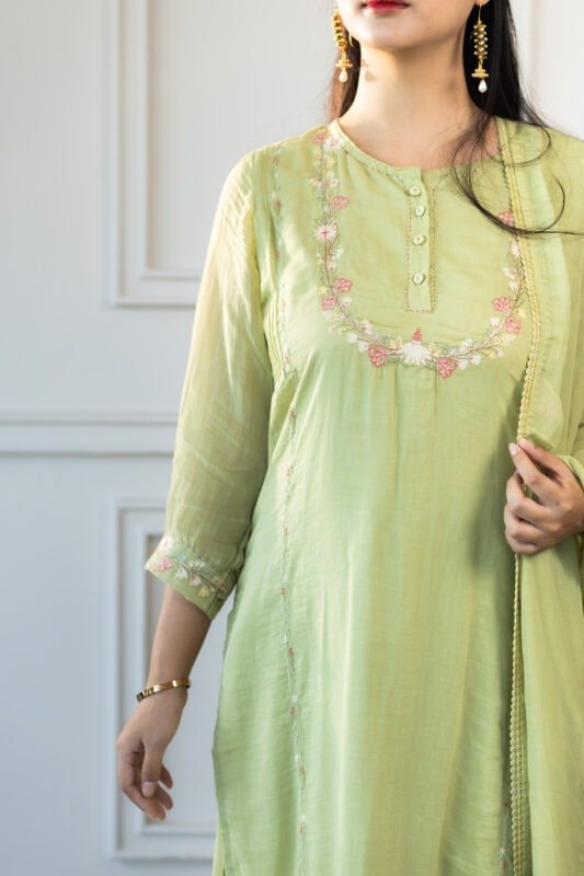 Close-up of Aravi kurti neckline embroidery with dupatta drape
