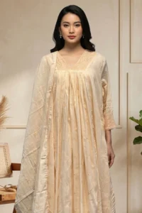 Model wearing Chanderi Blossom cream kurti with embroidery and matching dupatta