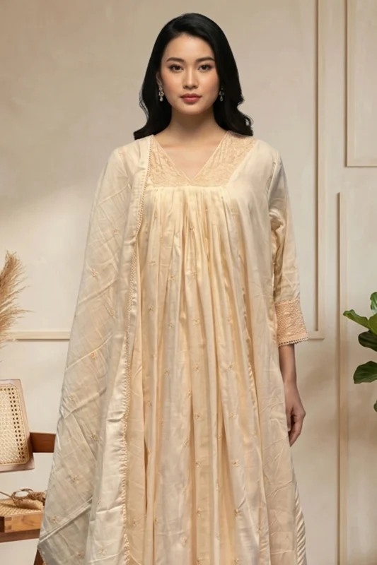 Model wearing Chanderi Blossom cream kurti with embroidery and matching dupatta