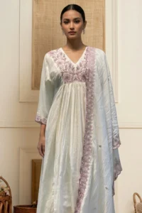 Althea Mul Cotton Luxe Kurti in white with lavender and green floral embroidery, V‑neckline, three‑quarter sleeves, and decorative border.