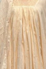 Close up of Chanderi Blossom cream elegance kurti showing detailed embroidery and V-neck design
