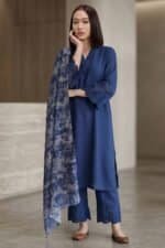 Full-length shot of the Vogue blue linen kurti set including straight-fit trousers and a decorative floral dupatta.