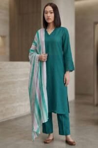 Full-length view of the teal Vogue linen kurti set with straight trousers and a coordinated striped dupatta.