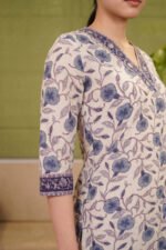 Detailed side shot of the Cerulean Print Kurti showcasing the classic three-quarter sleeves and the elegant dark blue bordered cuffs that perfectly complement the all-over floral pattern.