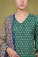 Close-up of the V-neckline of the Forest Flora kurti, showcasing the delicate leaf motif and the textured weave of the hand-block print fabric.