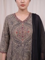 Close-up of the Graphite Mandala Kurti highlighting the structured V-neckline and a striking central mandala motif, detailed with subtle rust and red embellishments against an all-over intricate print.
