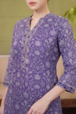 Side profile of the Indigo Petal Set highlighting the premium textured fabric, three-quarter sleeves with printed borders, and the elegant straight-fit silhouette.