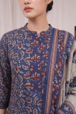 Close-up of the Indigo Petal Kurti highlighting the elegant mandarin collar and the structured front placket, detailed with delicate sequin embellishments that subtly catch the light against the rich floral print.