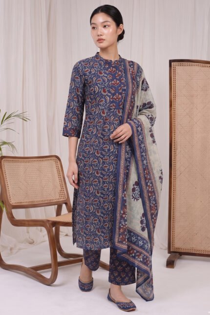 Full-length view of the Indigo Petal Kurti set, featuring a deep blue straight-cut kurta with traditional floral block prints, matching printed trousers, and a beautifully draped contrasting light dupatta.