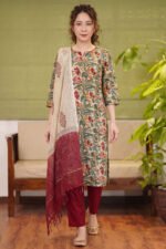 A full-length view of the Mughal Garden Suit featuring a beige cotton kurta with multicolored floral vine prints, paired with maroon trousers and a dual-toned dupatta.