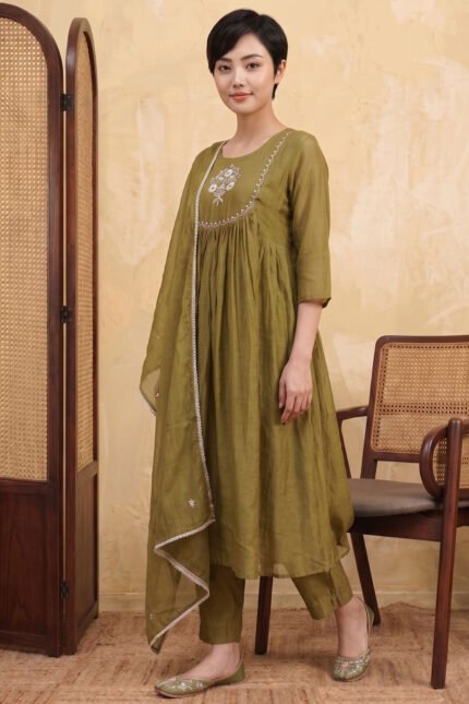 Full-length view of the Olive Gathered Kurti set, featuring an olive green flared kurta, matching tailored trousers, and a dupatta with a scalloped lace border.